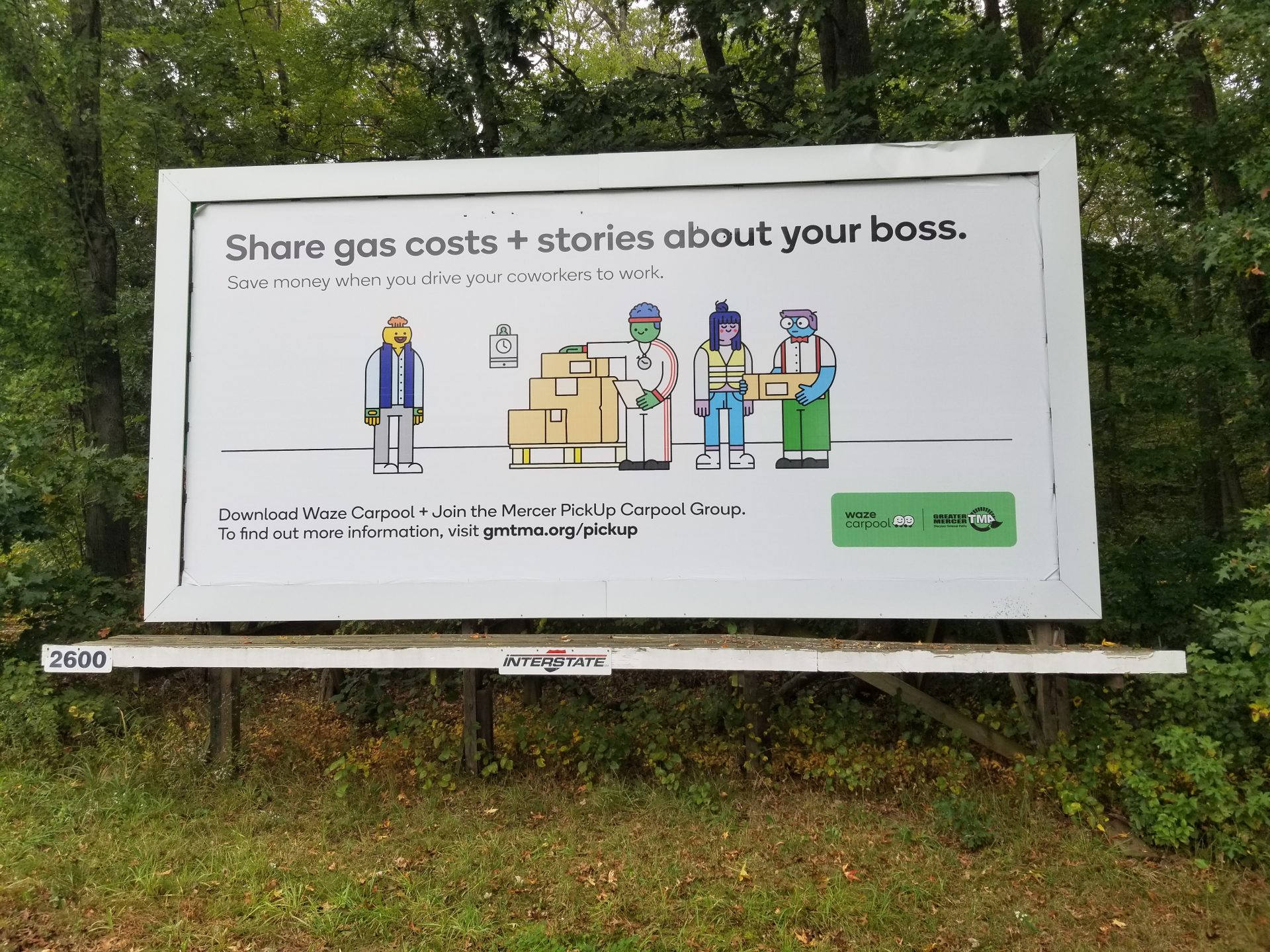 A billboard with four colorful characters advertises how to join the carpool program by GMTMA.