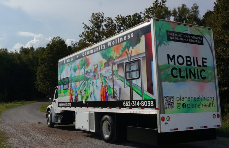 mobile clinic vehicle on country road
